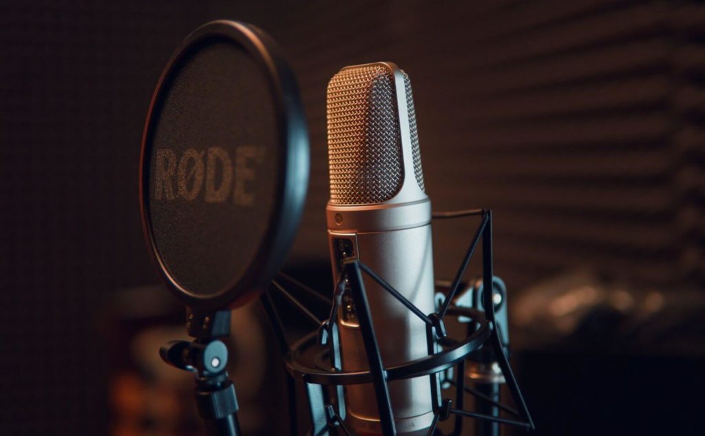 A close up of a recording studio microphone used for voice-overs, IVR voice prompts and telephone on-hold marketing